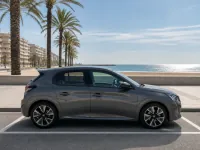 Peugeot e-208 — сбоку