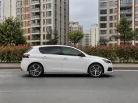Peugeot 308 — side