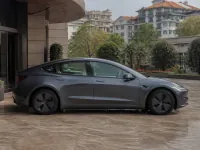 Tesla Model 3 — side
