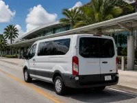 Ford Transit 350 12-Passenger — side