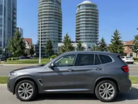 BMW X3 — zijkant