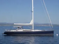 Maxi Dolphin 65 — laterale