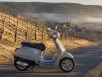 Vespa Primavera 50 — الجانب